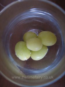 Cool your drink with frozen grapes!