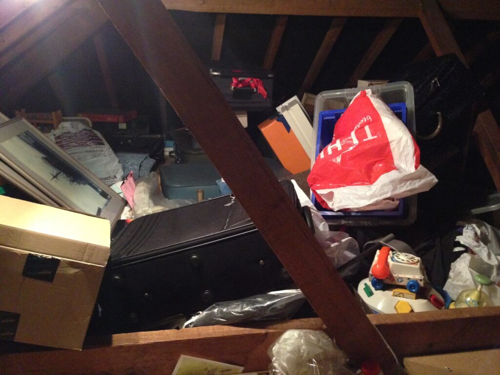 Messy loft before decluttering
